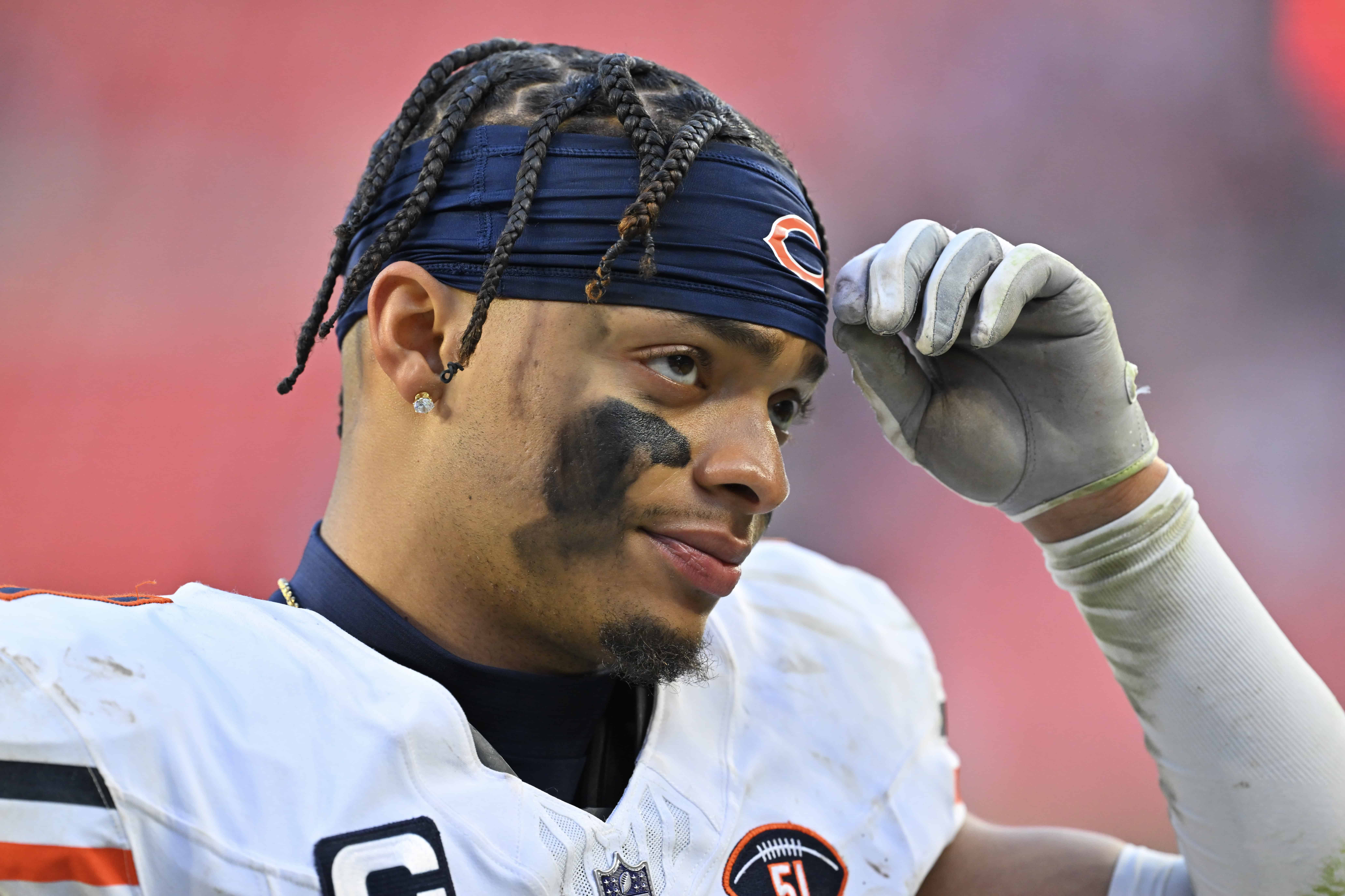 CLEVELAND, OHIO - DECEMBER 17: Justin Fields #1 of the Chicago Bears walks off the field after losing to the Cleveland Browns 20-17 at Cleveland Browns Stadium on December 17, 2023 in Cleveland, Ohio.